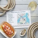 Lobster roll, oyster, and glass of white wine on a table with a map of Boston's historic bar crawl route.